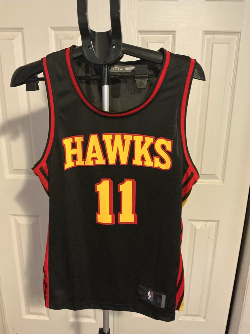 Fanatics Black Trae Young Hawks Basketball Jersey with Red and Yellow Accents